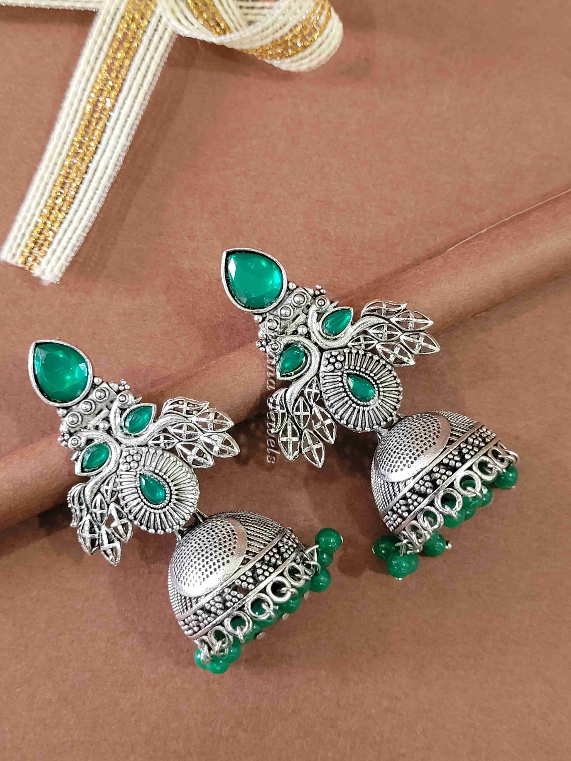 Ornate Oxidised Silver Jhumkas with Ruby Stones