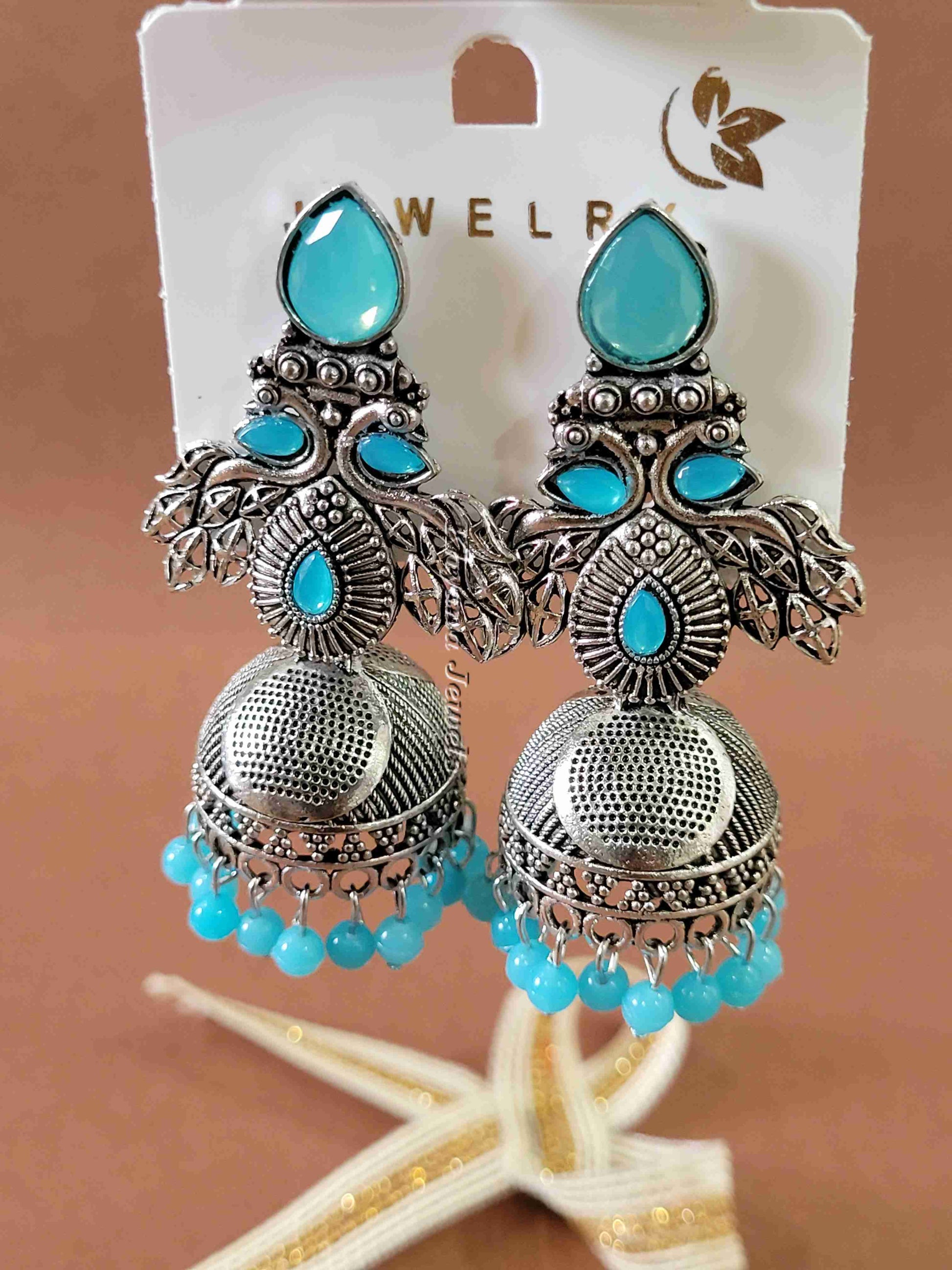 Ornate Oxidised Silver Jhumkas with Ruby Stones