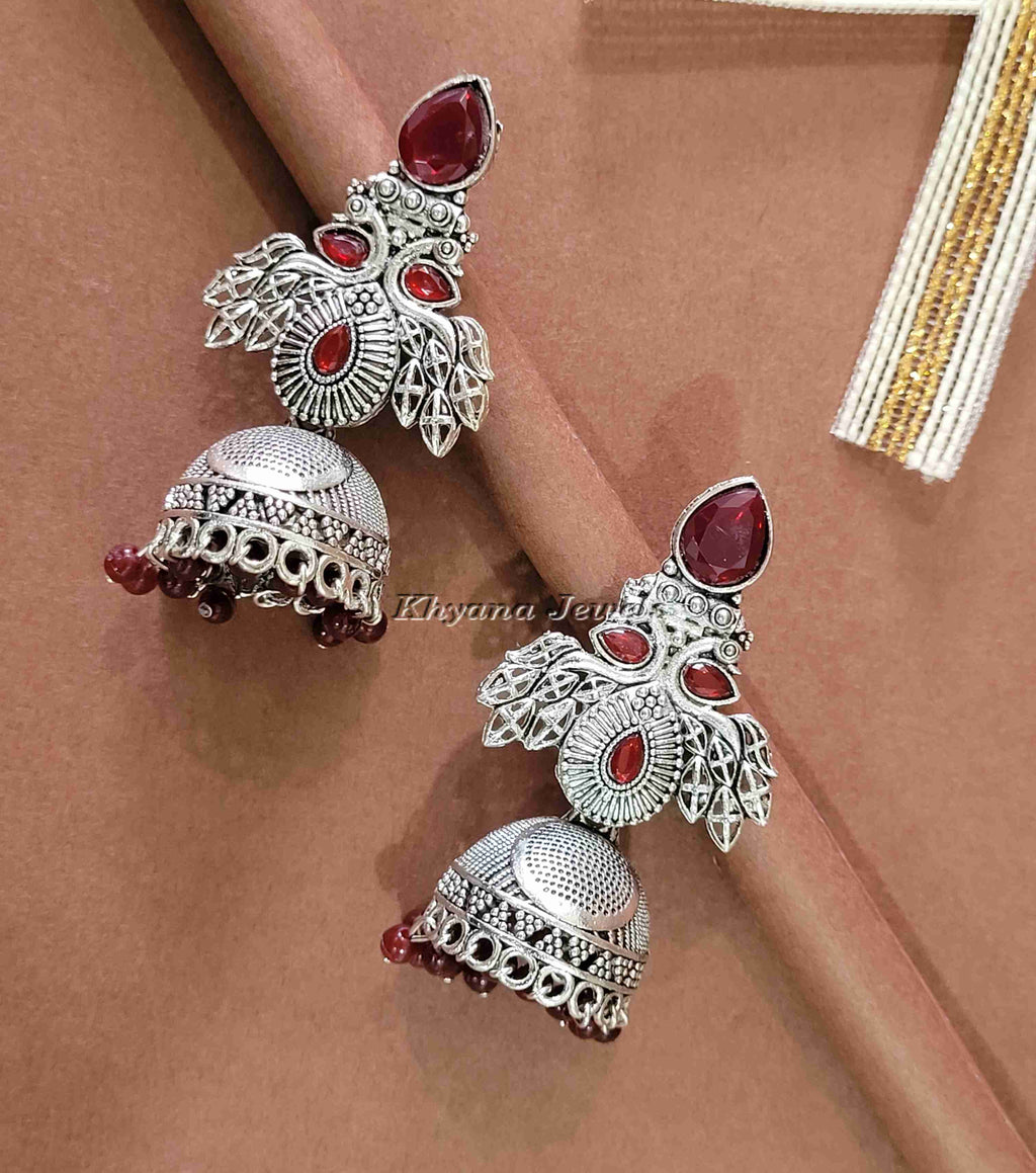Ornate Oxidised Silver Jhumkas with Ruby Stones