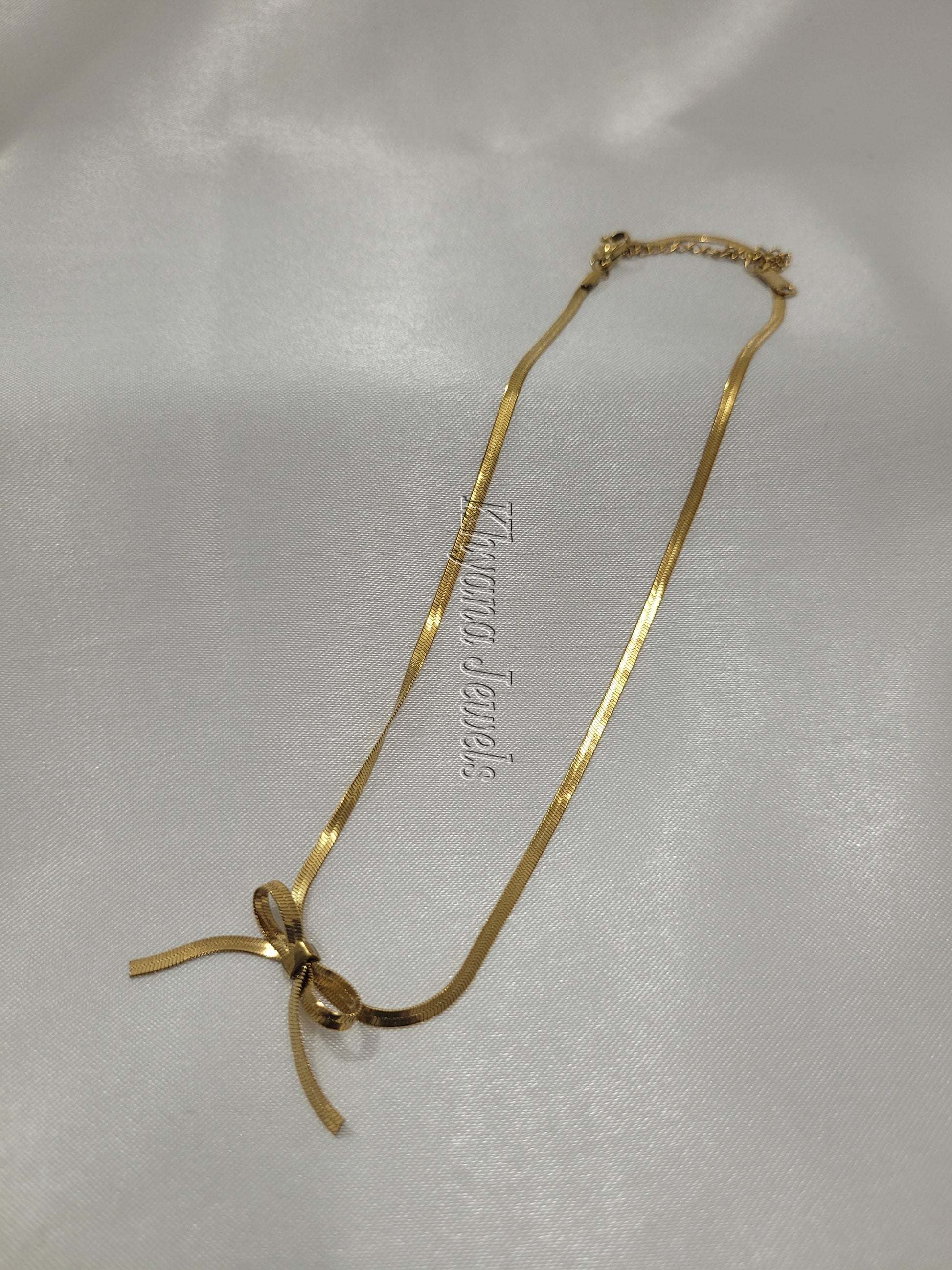 Golden Ribbon Charm Herringbone Necklace