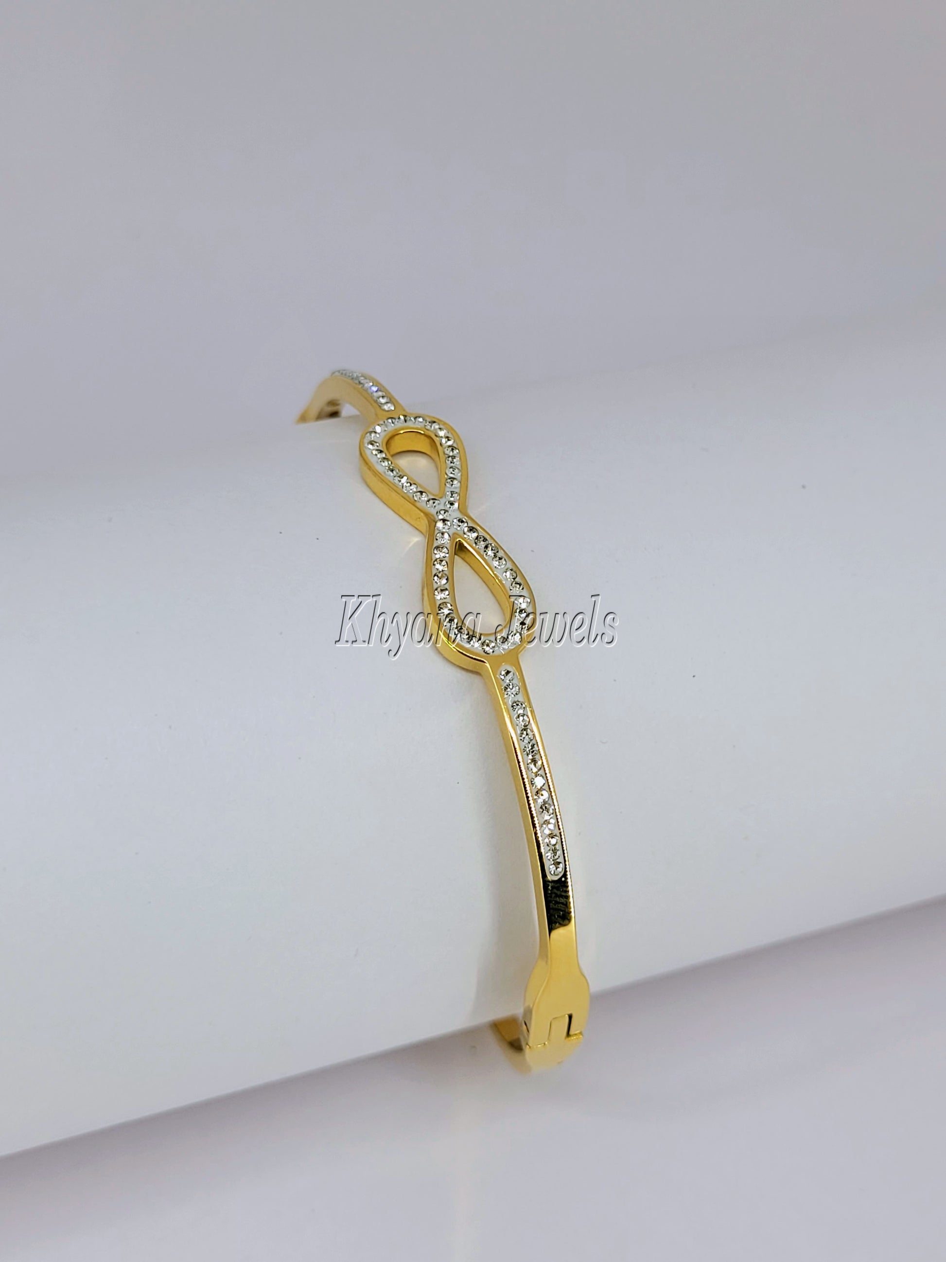 Gold Plated Infinity Kada Bracelet with Sparkling Stone Detailing