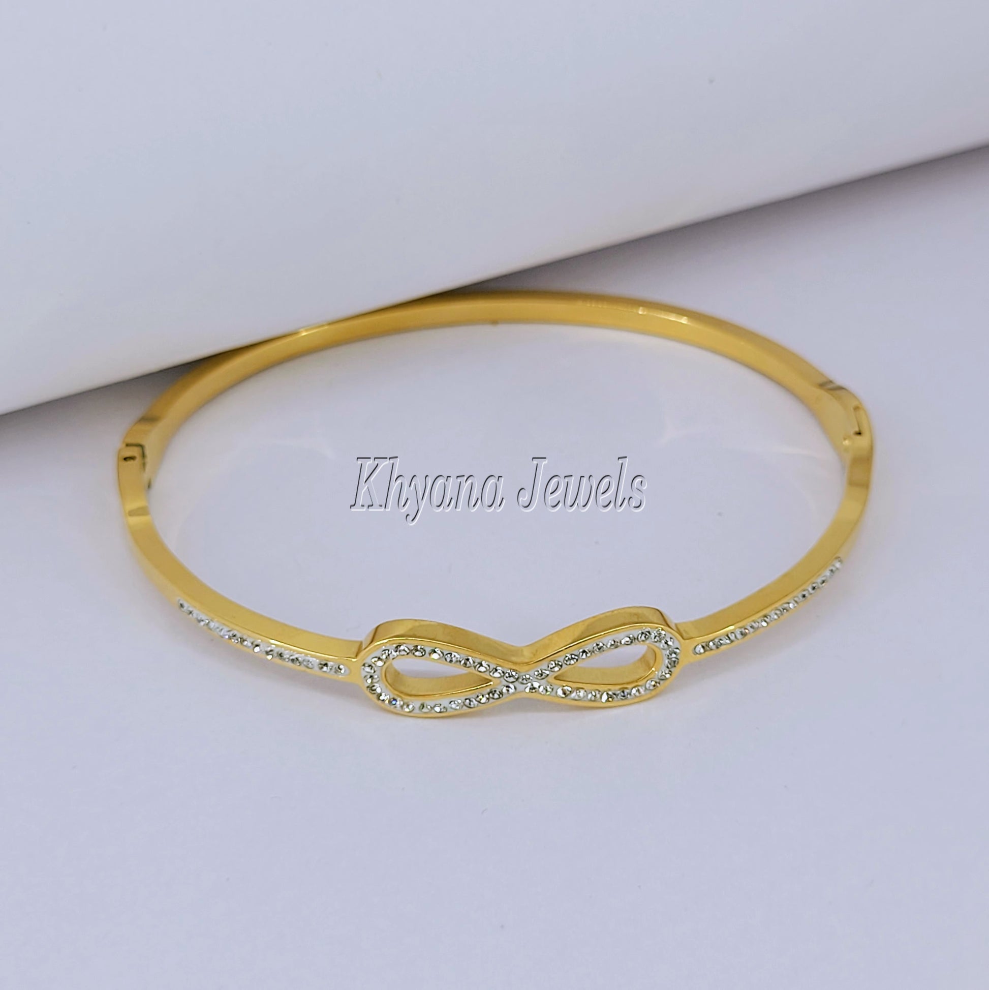 Gold Plated Infinity Kada Bracelet with Sparkling Stone Detailing