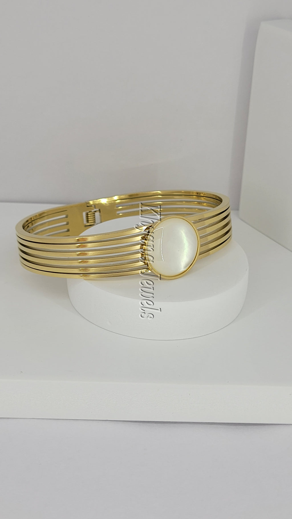 Gold Plated Bangle with Clear Glass Centerpiece