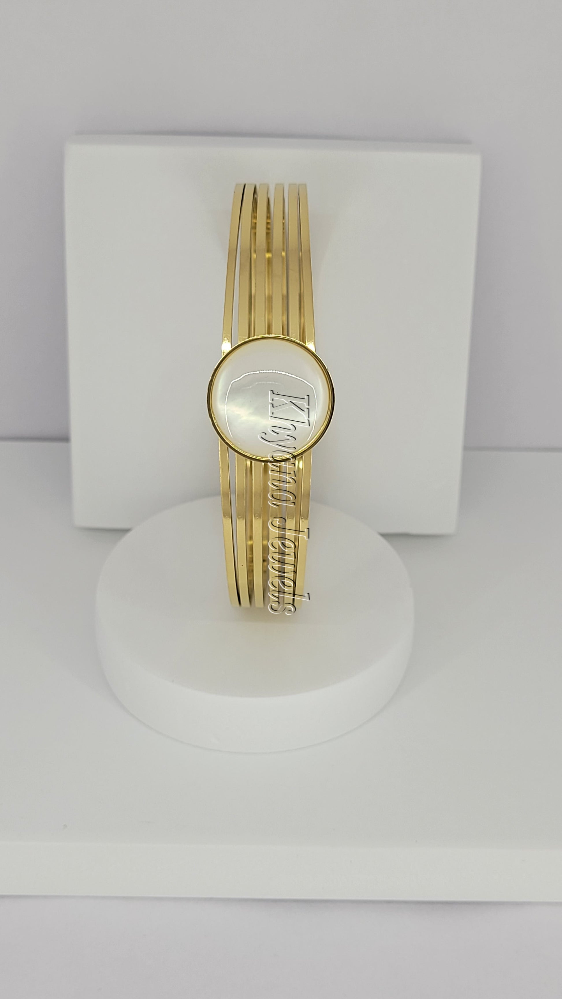 Gold Plated Bangle with Clear Glass Centerpiece