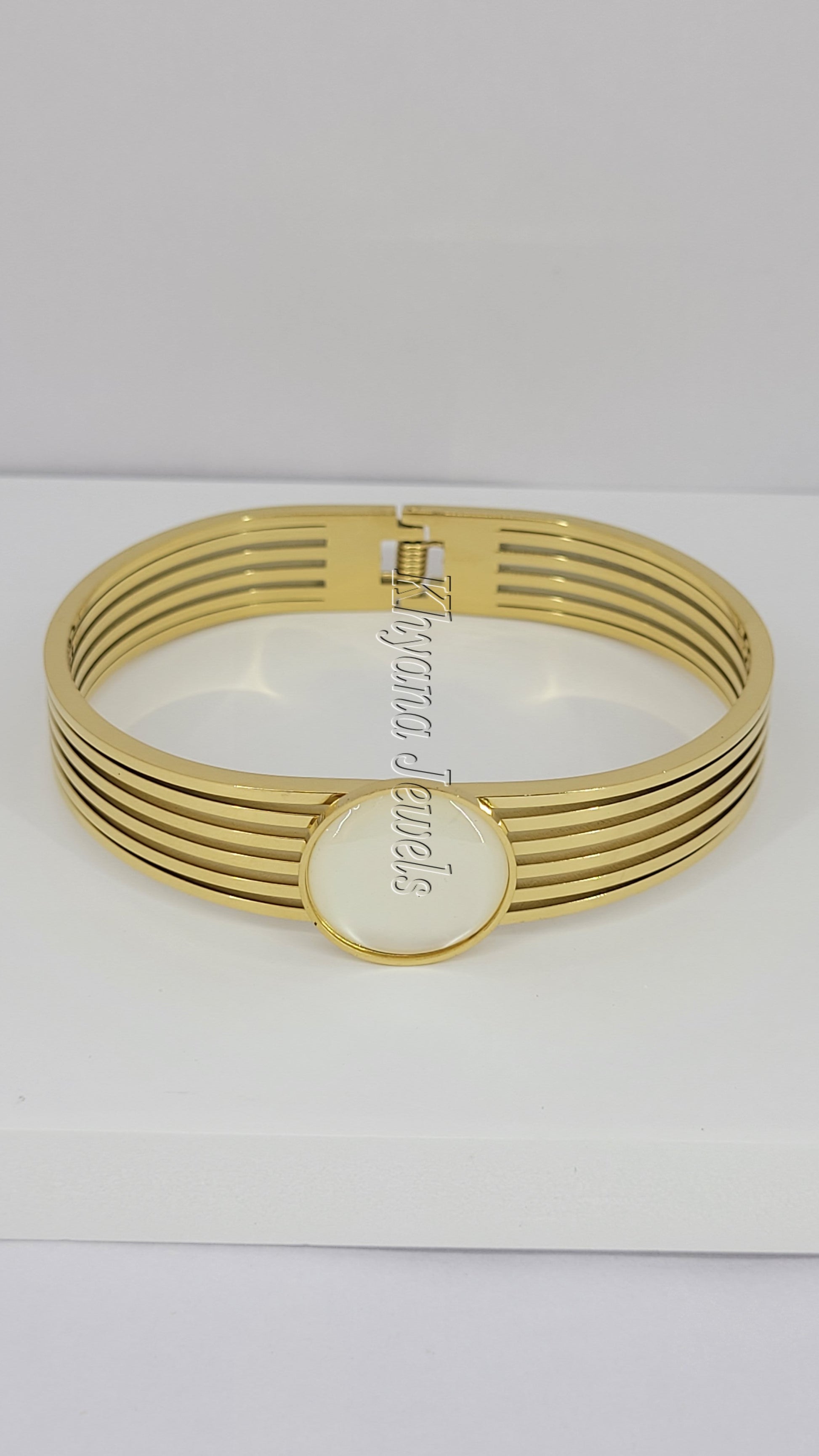 Gold Plated Bangle with Clear Glass Centerpiece