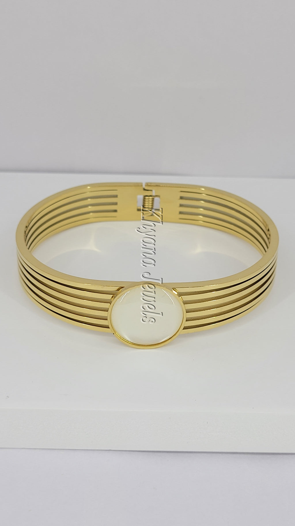 Gold Plated Bangle with Clear Glass Centerpiece