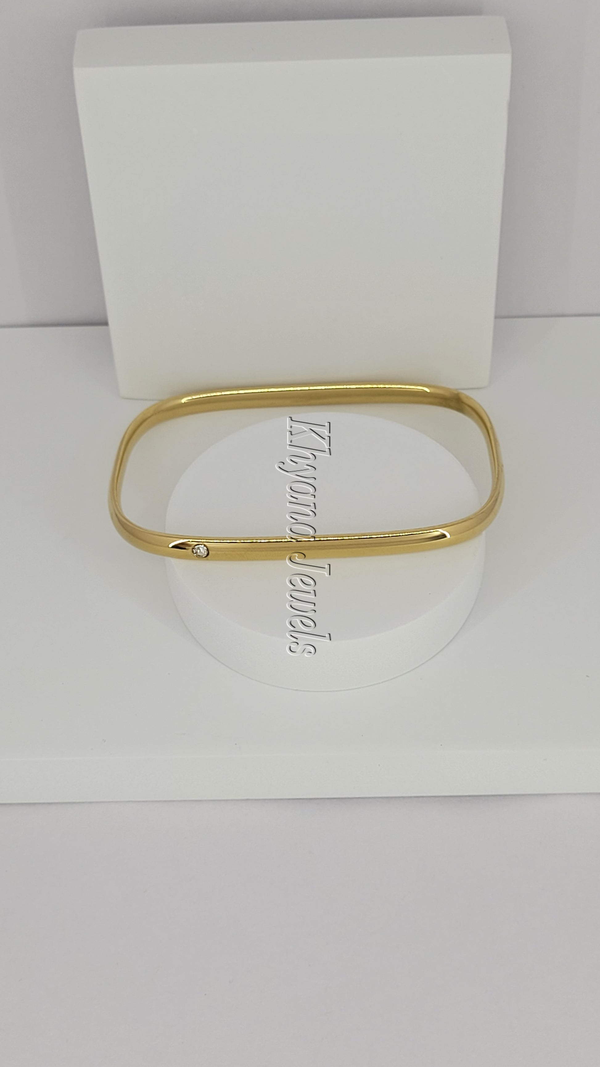 Slim Gold Plated Square Bangle with Single Stone Accent