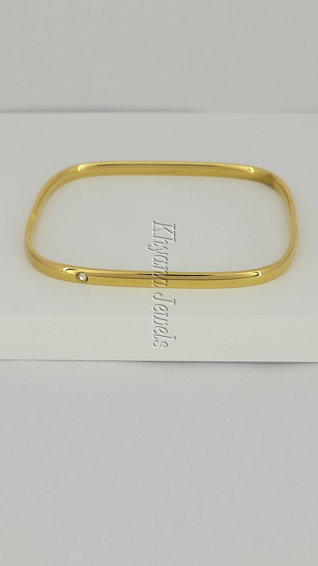 Slim Gold Plated Square Bangle with Single Stone Accent