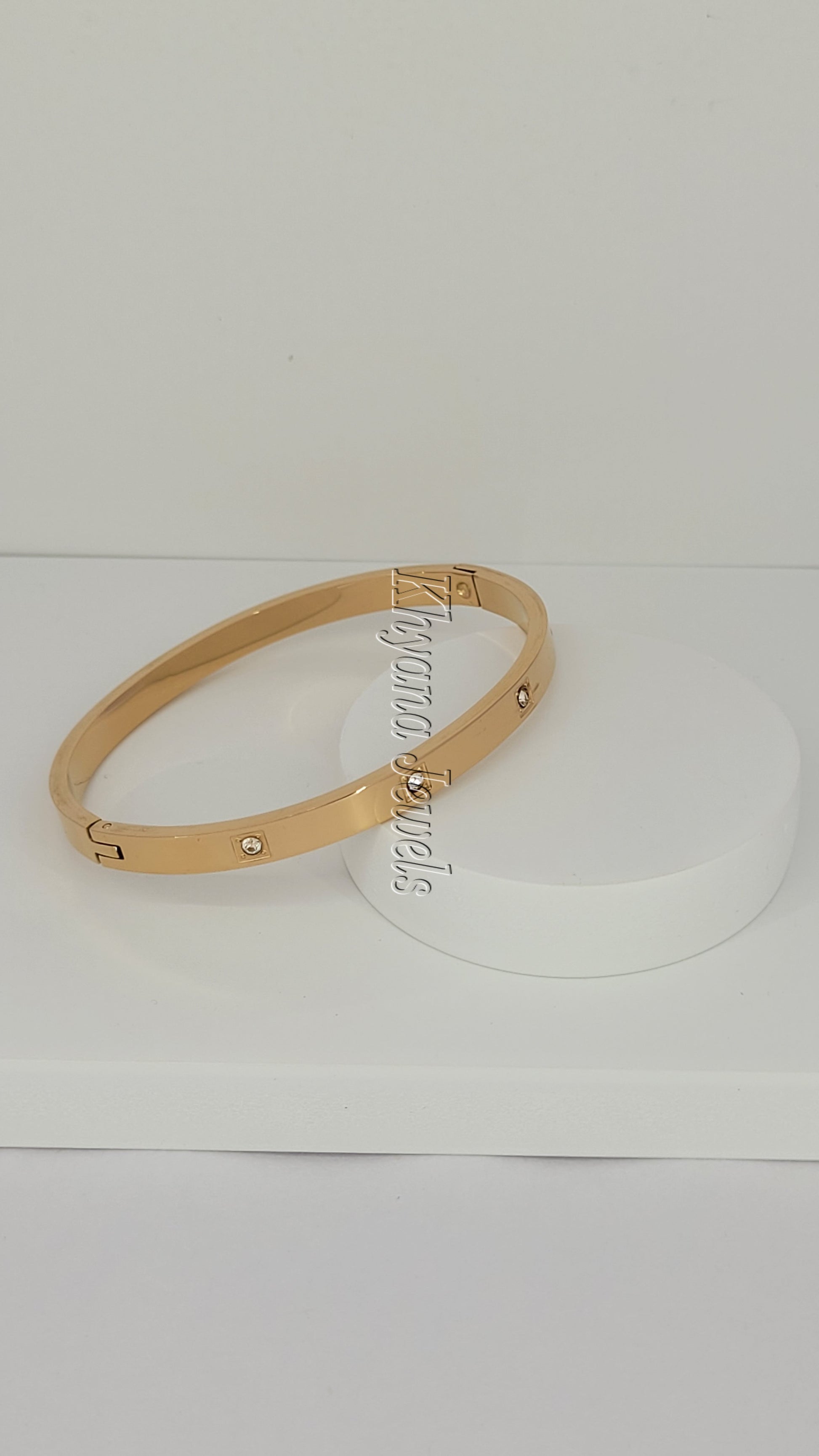 Rose Gold Bangle with Embedded Crystals
