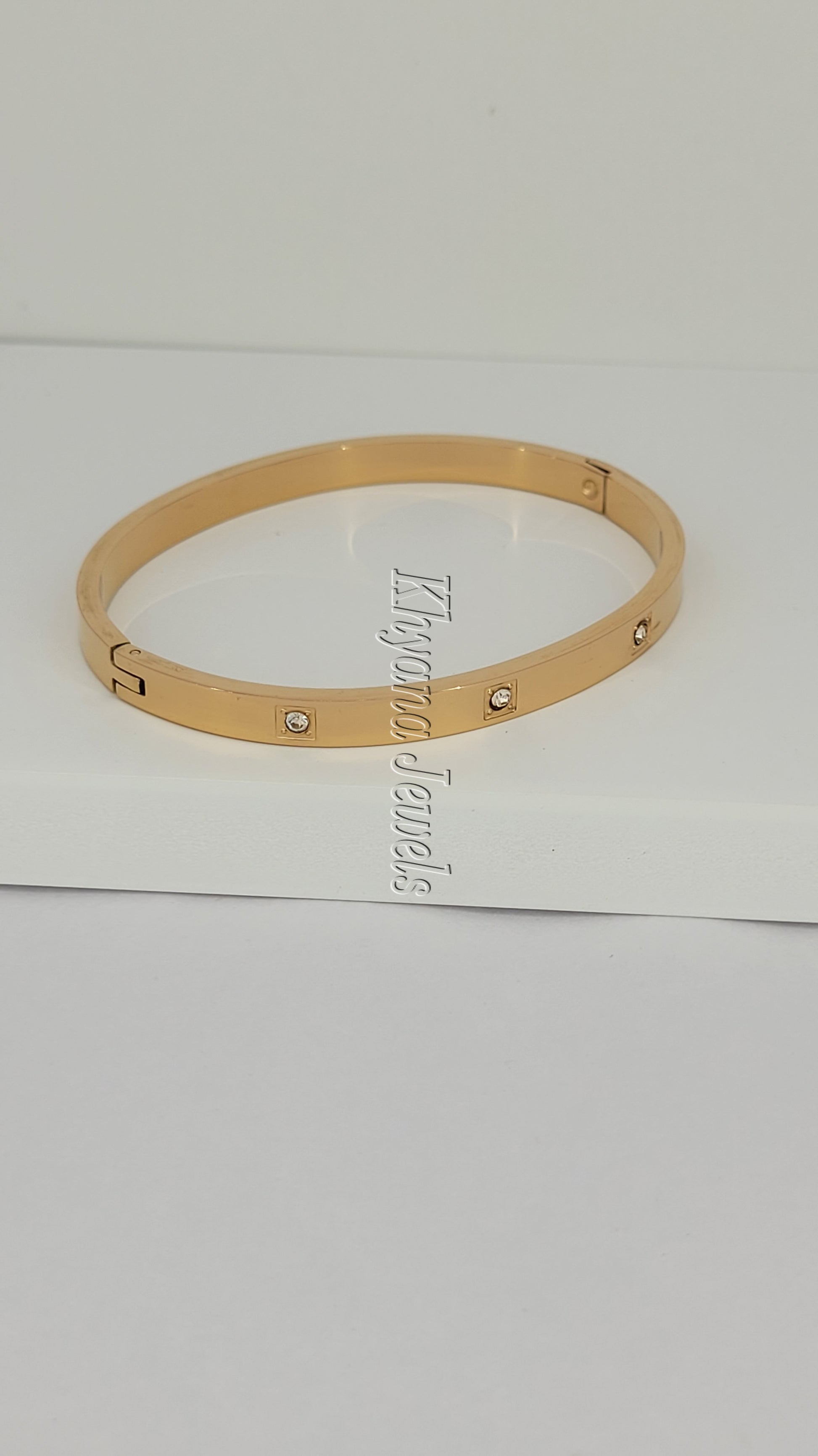 Rose Gold Bangle with Embedded Crystals