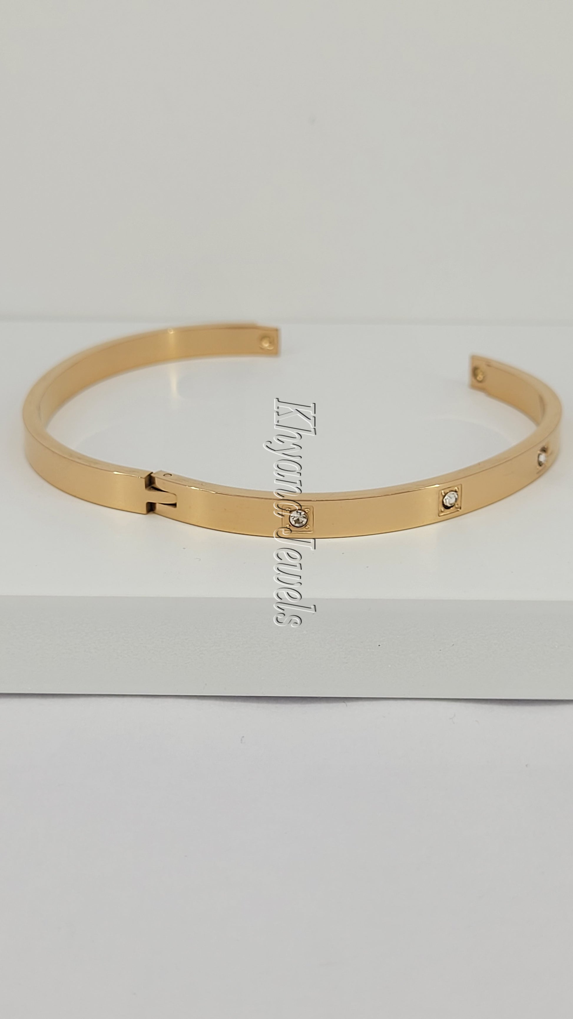 Rose Gold Bangle with Embedded Crystals