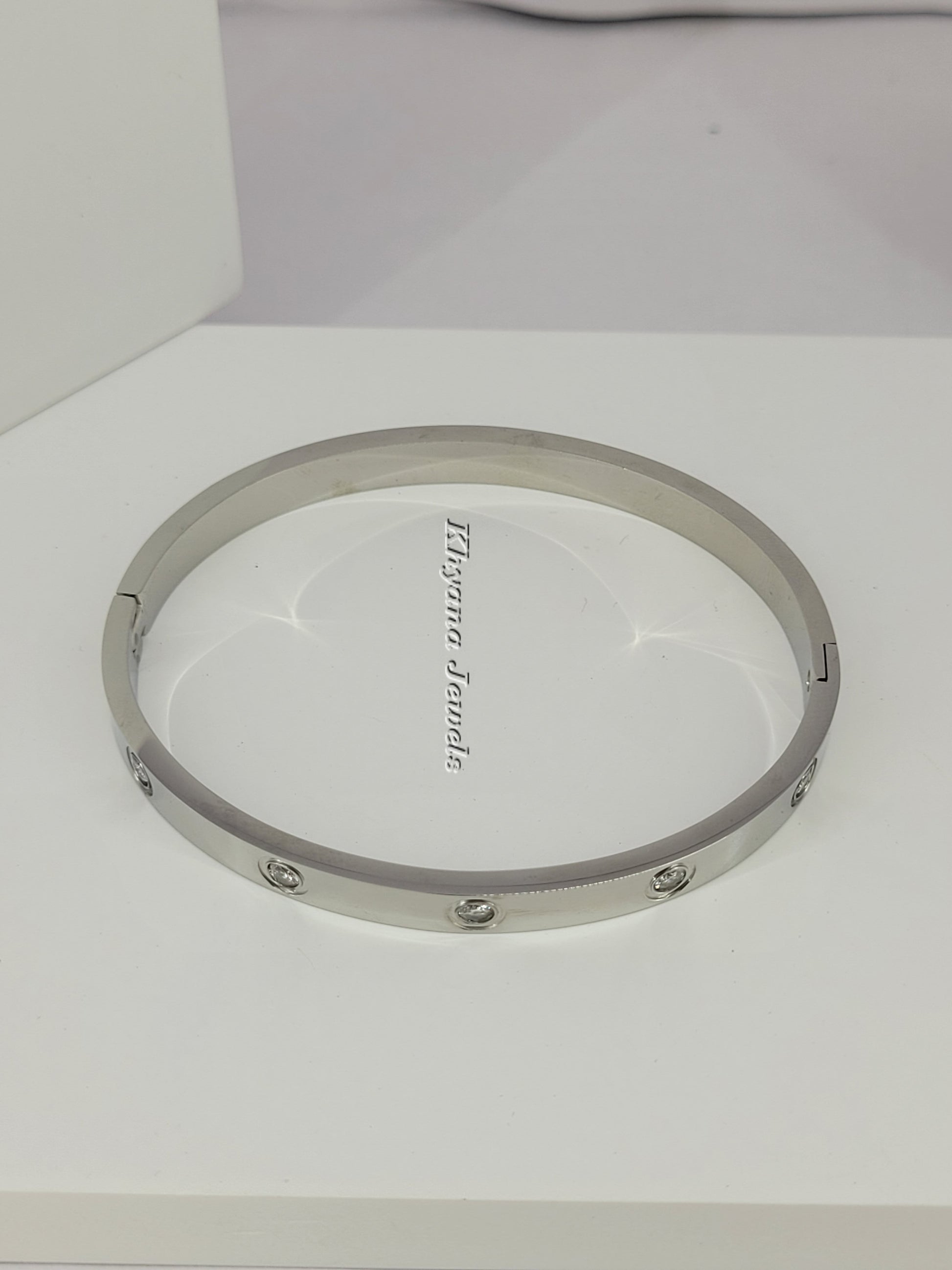 Silver Plated Bangle Bracelet with Embedded Crystals