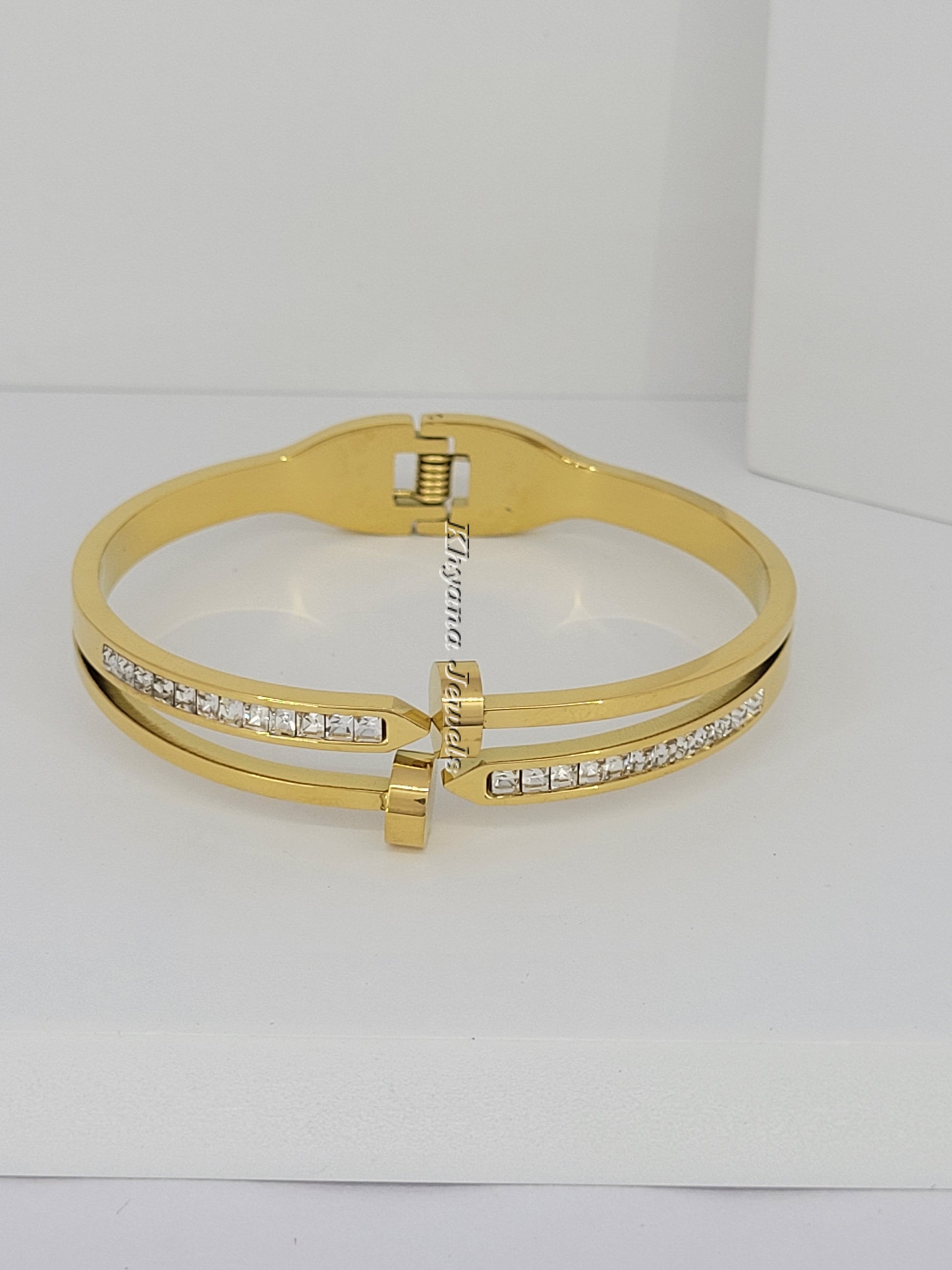 Nail-Inspired Gold Plated Bangle Bracelet with Crystal Lining