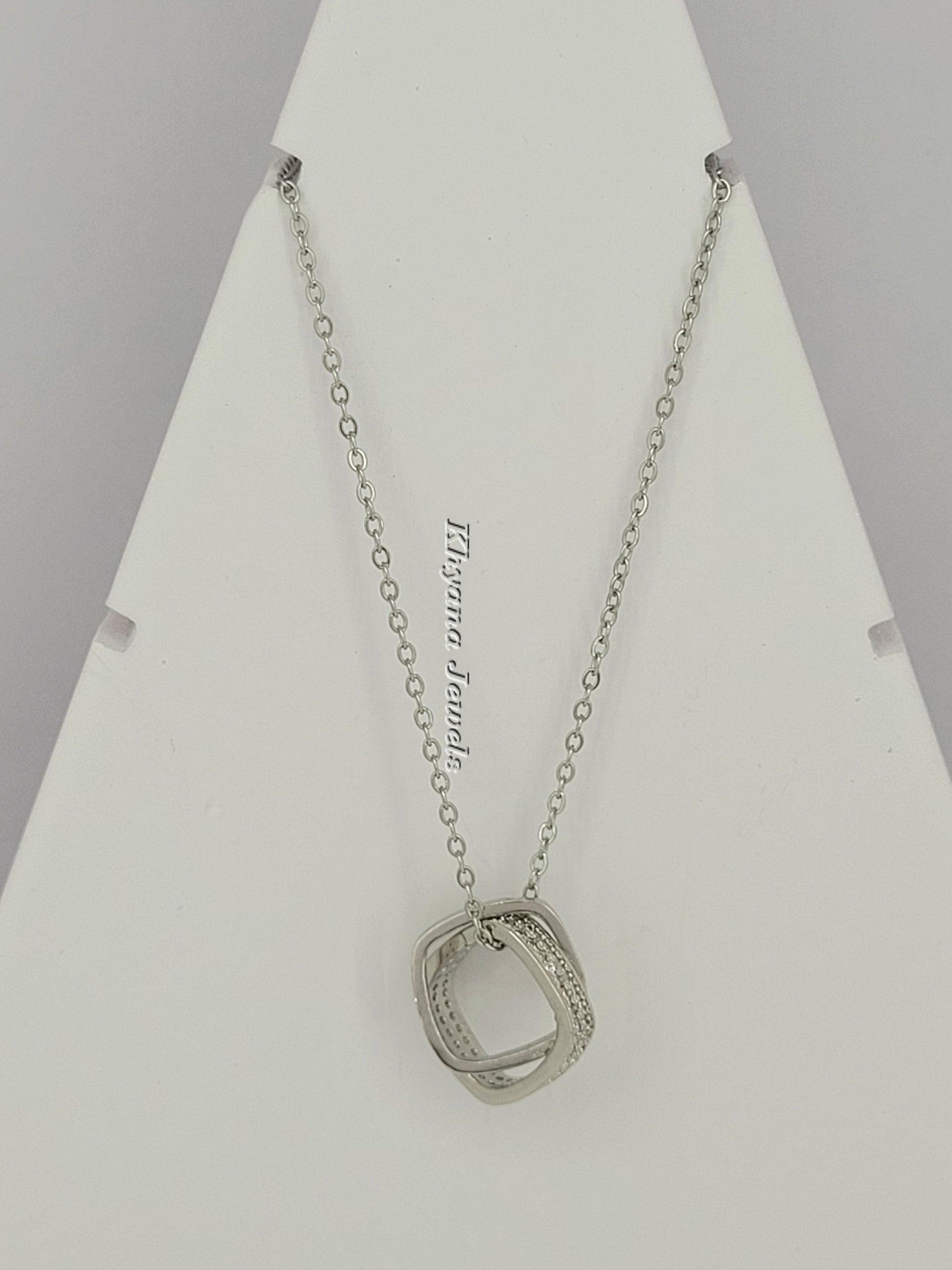 Silver-Plated Geometric Twist Pendant Necklace