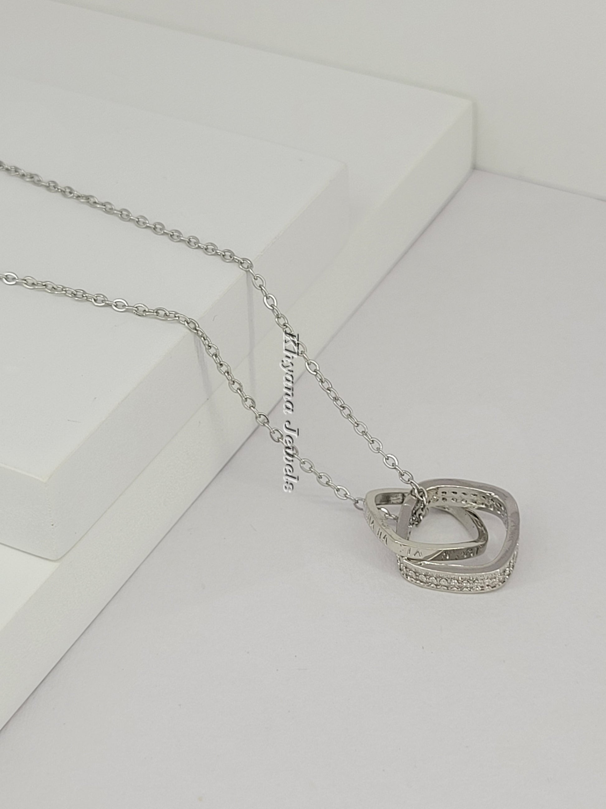 Silver-Plated Geometric Twist Pendant Necklace